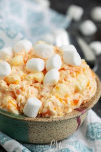 Orange Creamsicle Fluff with Cottage Cheese recipe is a family favorite fruit salad with Cool Whip, mandarine oranges, and marshmallows.