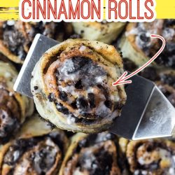Oreo Cinnamon Rolls - Fluffy dough is stuffed with crushed cookies and cream cookies and smothered with a powdered sugar glaze.