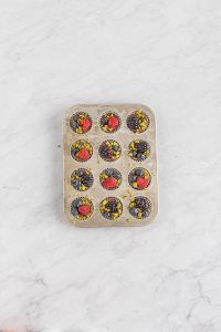 Chocolate Berry Cups Smooth, creamy dark chocolate & almond bark are mixed then topped with pistachios & berries for added flavor. Great for gifts. Perfect for parties. #chocolate #truffles #recipes #gifts #callmepmc
