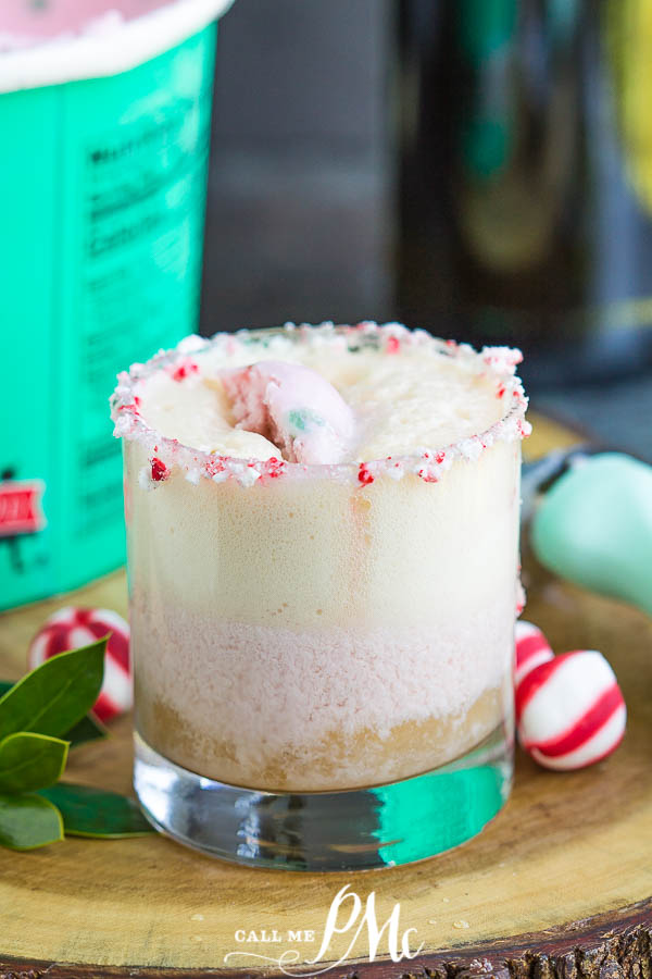 crushed peppermint candies on rim of champagne ice cream float in a cocktail glass
