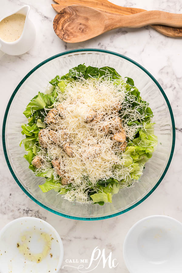 lettuce, chicken, and cheese in salad serving bowl 10 Minute Chicken Caesar
