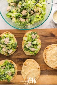 Chicken Caesar Flatbreads mesan, and Caesar dressing and toss to mix.