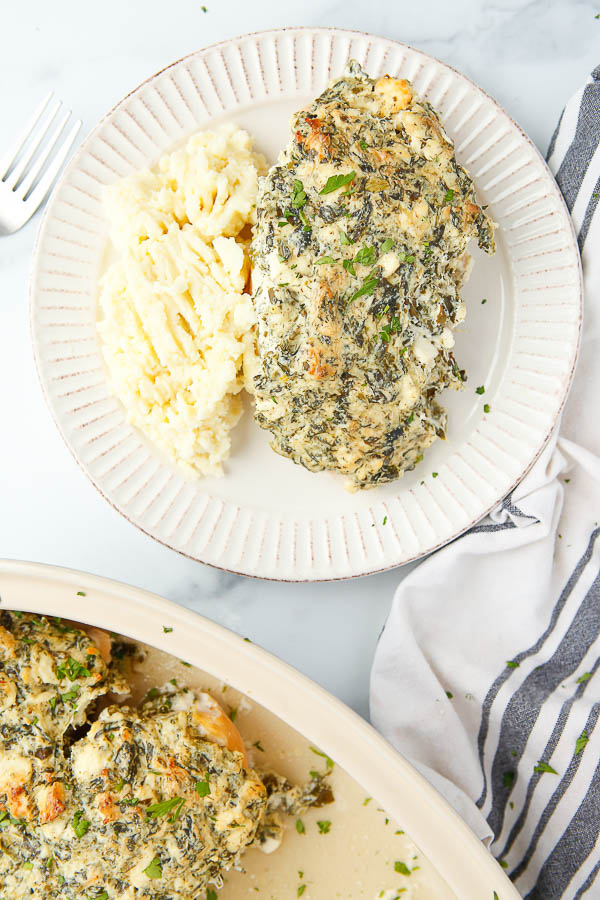 Baked Chicken with spinach on plate