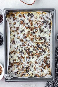 Triple Berry Magic Bars Recipe by callmepmc.com is sweet, buttery, and salty, and packed with real cranberries, blueberries, and cherries. This recipe is simple and easily adaptable. #baking #dessert #recipe #callmepmc