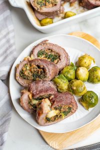 Asian Stuffed Pork Tenderloin recipe is filled with spinach, mushrooms, & breadcrumbs then cooked in the oven until tender & juicy.