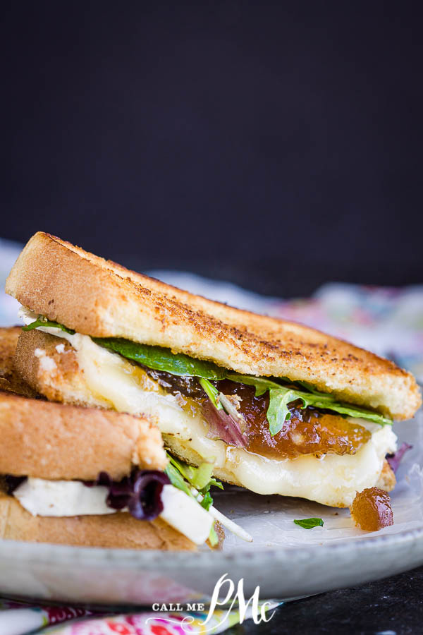 Brie Fig Grilled Cheese - Gourmet grilled cheese sandwich oozing with melted brie cheese and fig preserve nestled between buttery bread! It's out-of-this-world good! #grilledcheese #recipe #sandwich #callmepmc