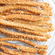 Southern Cheddar Cheese Straws are crispy, savory, and packed with cheese. This recipe will become a small obsession!