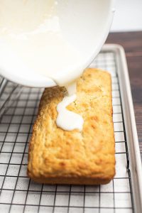 This simple half pound cake is flavored with lemon then smothered with a lusciously thick layer of lemon glaze.