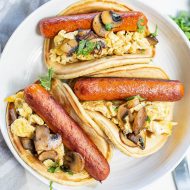 The best breakfast, Sausage Pancake Tacos, is loaded with sausage and scrambled eggs then stuffed in a homemade pancake.