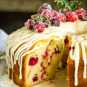 White Chocolate Cranberry Bundt Cake has fresh cranberries, Greek yogurt, and white chocolate making it rich and luscious.