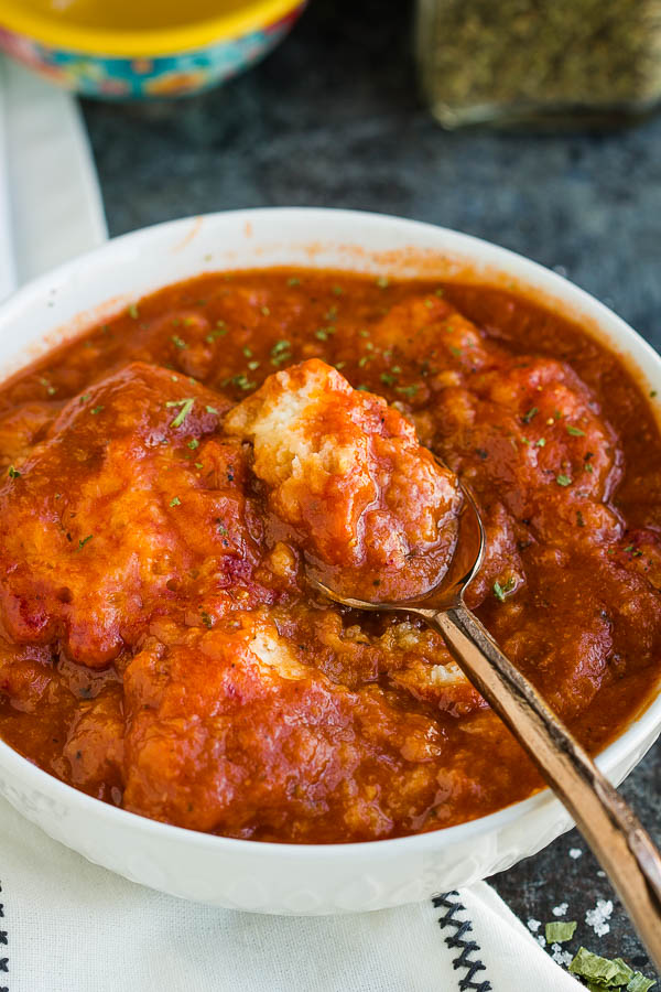 bowl of dumplings in tomato sauce