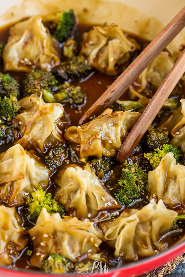 dumplings in sauce with broccoli