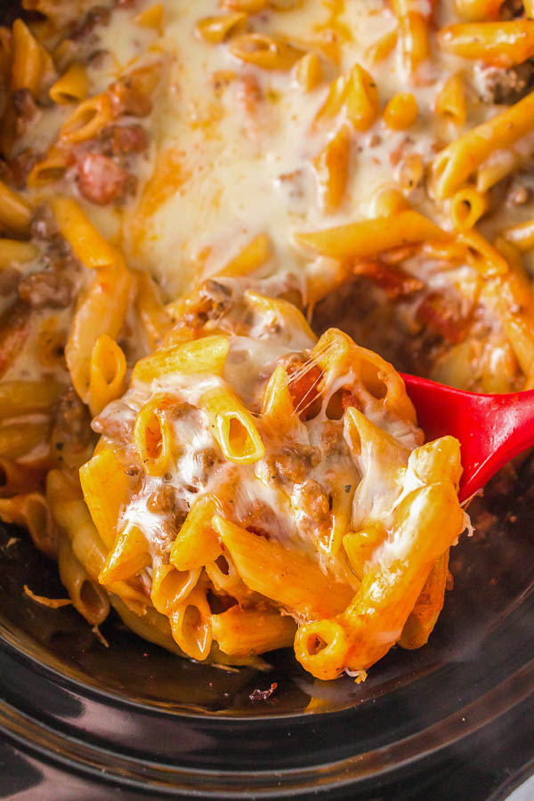 A cheesy penne dish cooked in a slow cooker.