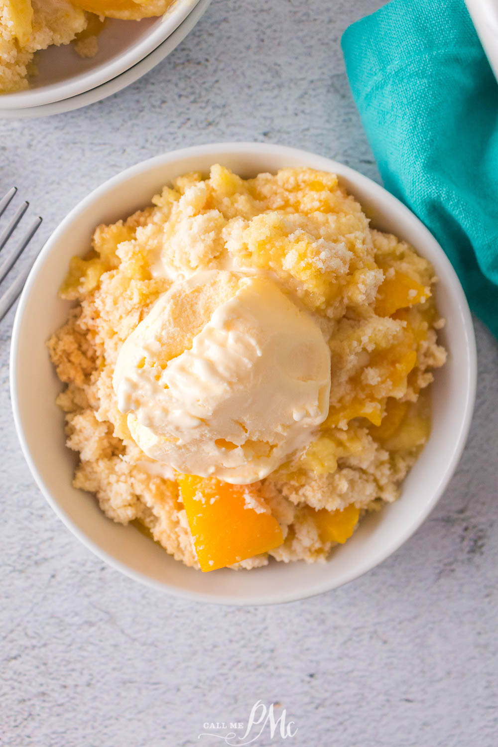 Bowl of dessert topped with ice cream.