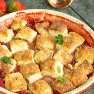 Southern Homemade Strawberry Cobbler Recipe {fresh or frozen} by Call Me PMc is a classic dessert recipe that's easy to make. It's delicious served warm with vanilla ice cream. This recipe doesn't use Bisquick or cake mix