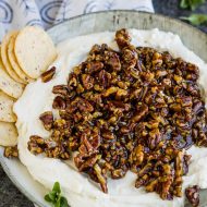 Whipped Goat Cheese with NOLA Savory Praline Sauce, incredibly easy whipped goat cheese is smothered with a New Orleans-inspired savory pecan praline sauce. This cheese spread dip will blow your mind it is so good!