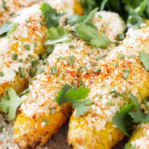 Grilled Corn on the Cob in Foil with Mayo, aka Grilled Mexican Street Corn or Grilled Elotes, is sweet, smoky, creamy, & tangy. #corn #elotes #streetcorn #recipes #grill