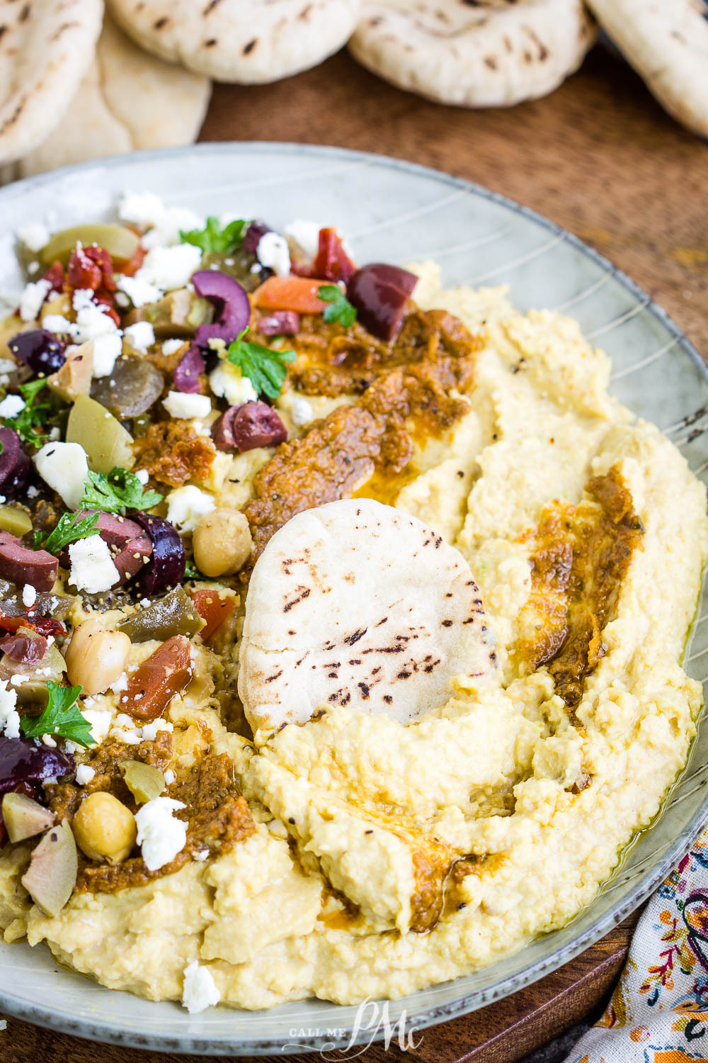 Pickled veggie and tomato pesto loaded hummus