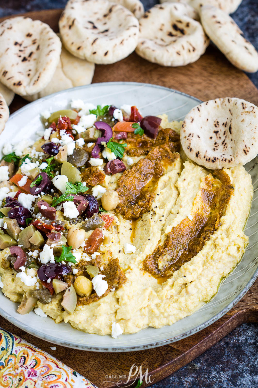 Pickled veggie and tomato pesto loaded hummus