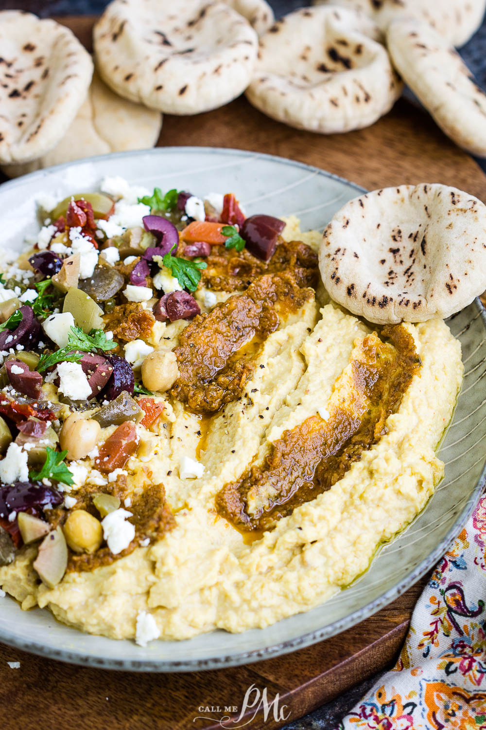 Pickled veggie and tomato pesto loaded hummus