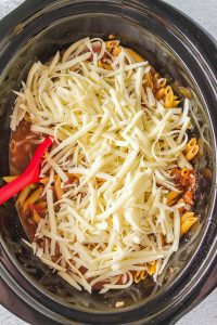 A Slow Cooker filled with Cheesy Penne.