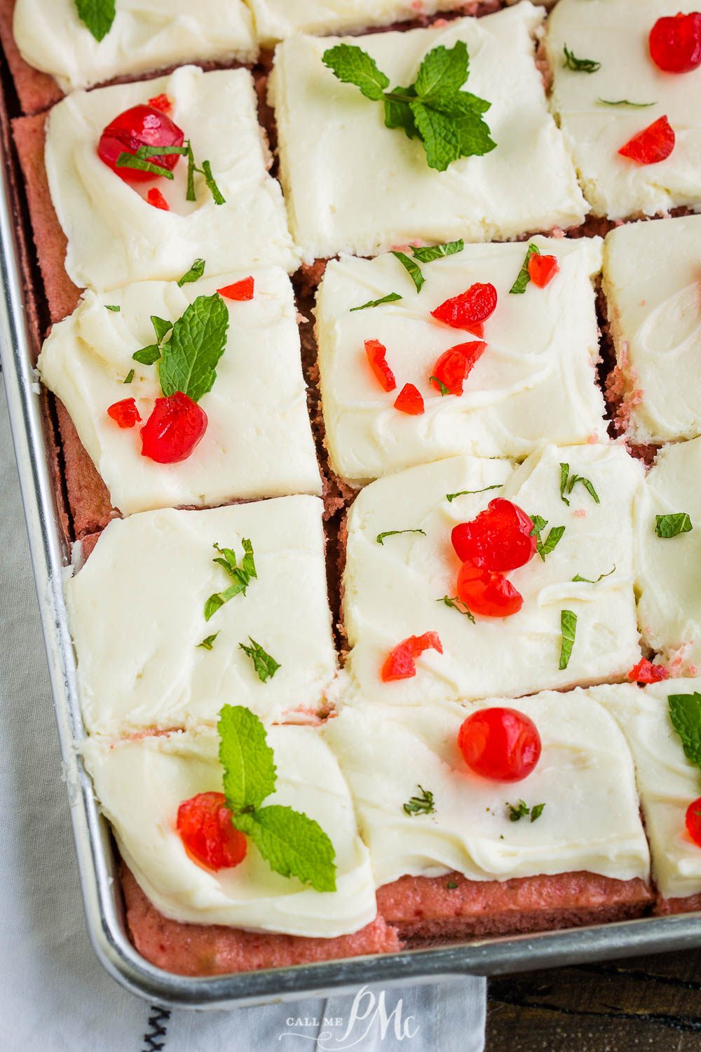 Cherry cake cut but still in the sheet pan.