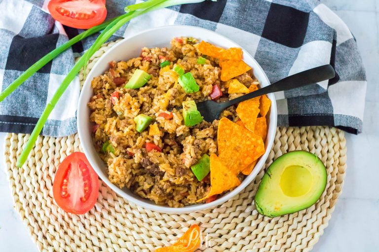 One Pan Fajita Rice Casserole is an easy & tasty meal that's ready in just over 30 minutes. This recipe has all the Tex-Mex flavors you love without paying restaurant prices to get them! #texmex #casserole #tacos #fajitas #30minutemeal