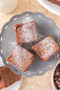 Gooey Condensed Milk Brownies an easy, gooey & chewy recipe. They're comforting, addictive, & decadent made with pantry staples. #brownies #chocolate #recipe #dessert