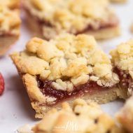 Soft and chewy bottom, gooey, jammy center and crispy crumble topping make these Strawberry Streusel Bars perfect. Plus, they're easy to make! #strawberry #dessert #streuselbars