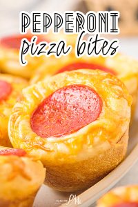 Muffin Pan Pepperoni Pizza Bites arranged on a plate.