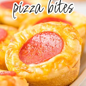 These fluffy Muffin Pan Pepperoni Pizza Bites, make-ahead snacks that take just 4 ingredients. Frozen roll dough with a variety of toppings. #appertizers #pizzabites