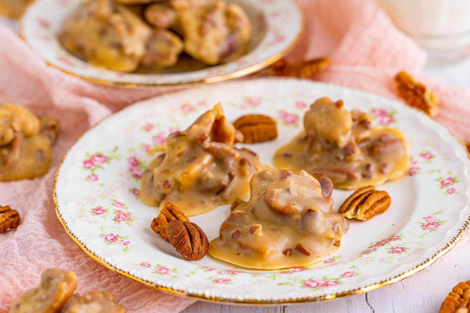 Southern Pecan Praline Recipe is deliciously creamy and crunchy candy made with butter, sugar, cream, and pecans. It's the perfect candy to make all year long.
