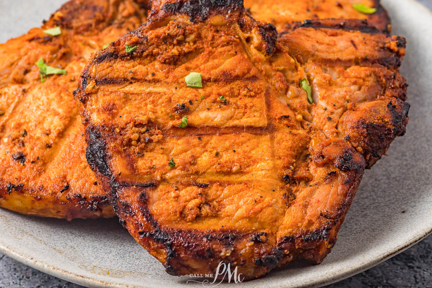 Close up photo of grilled boneless pork chops.