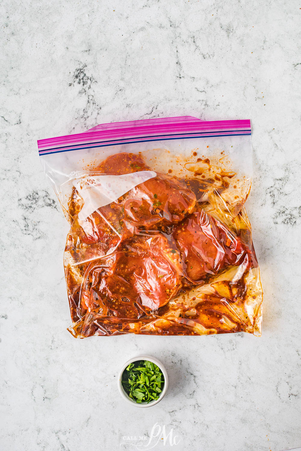 marinating pork chops in a Ziploc storage bag.