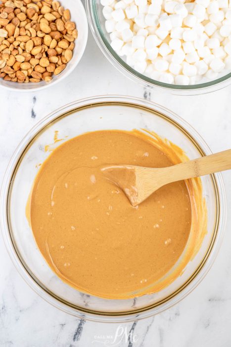 stirring melted butterscotch chips in a glass bowl.