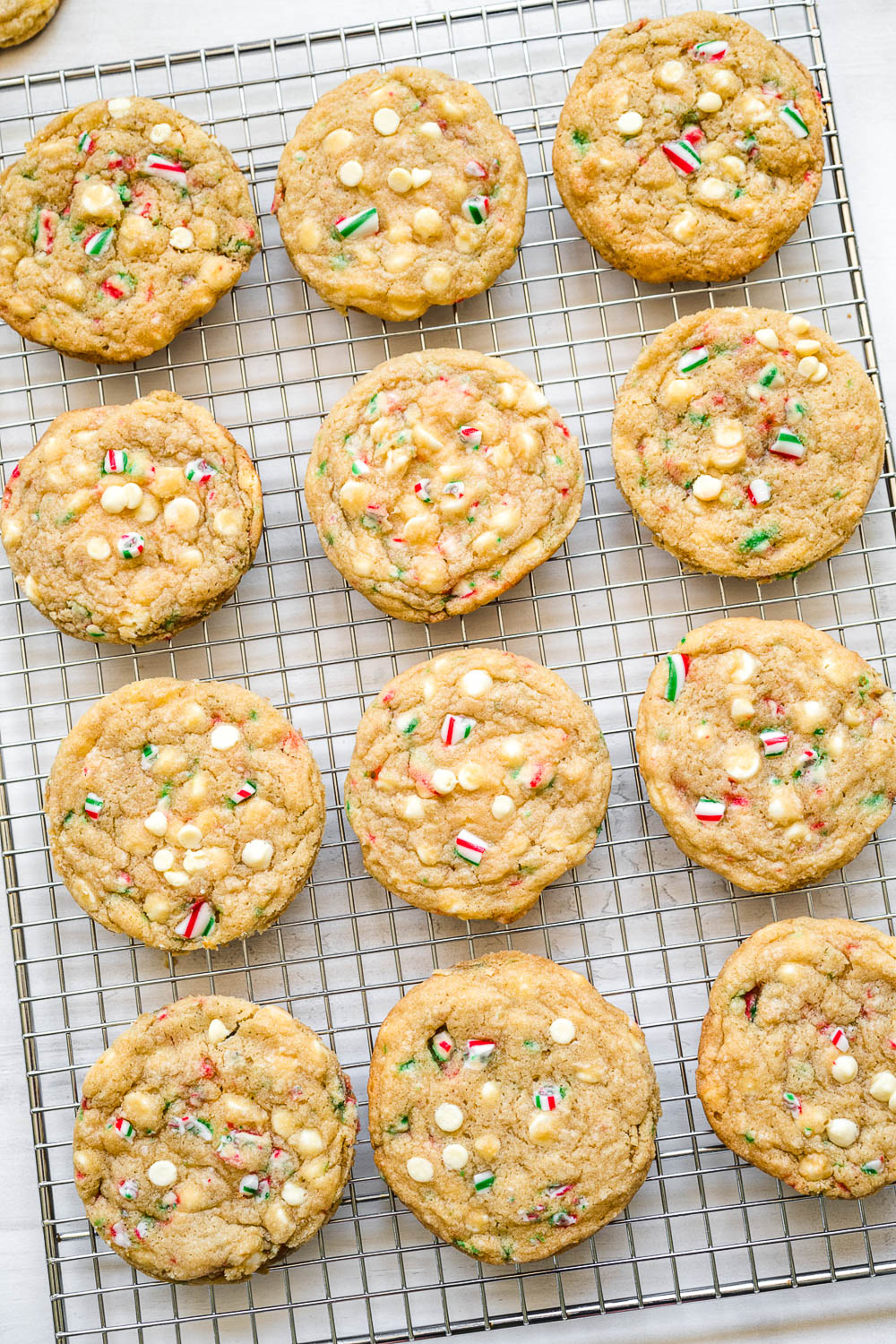 peppermint cookies cooling on a metal rack.