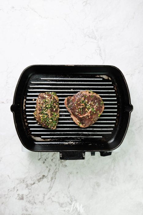 raw steak on inside grill