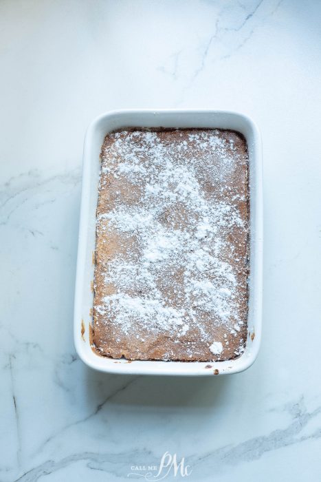 dessert in dish sprinkled with powdered sugar