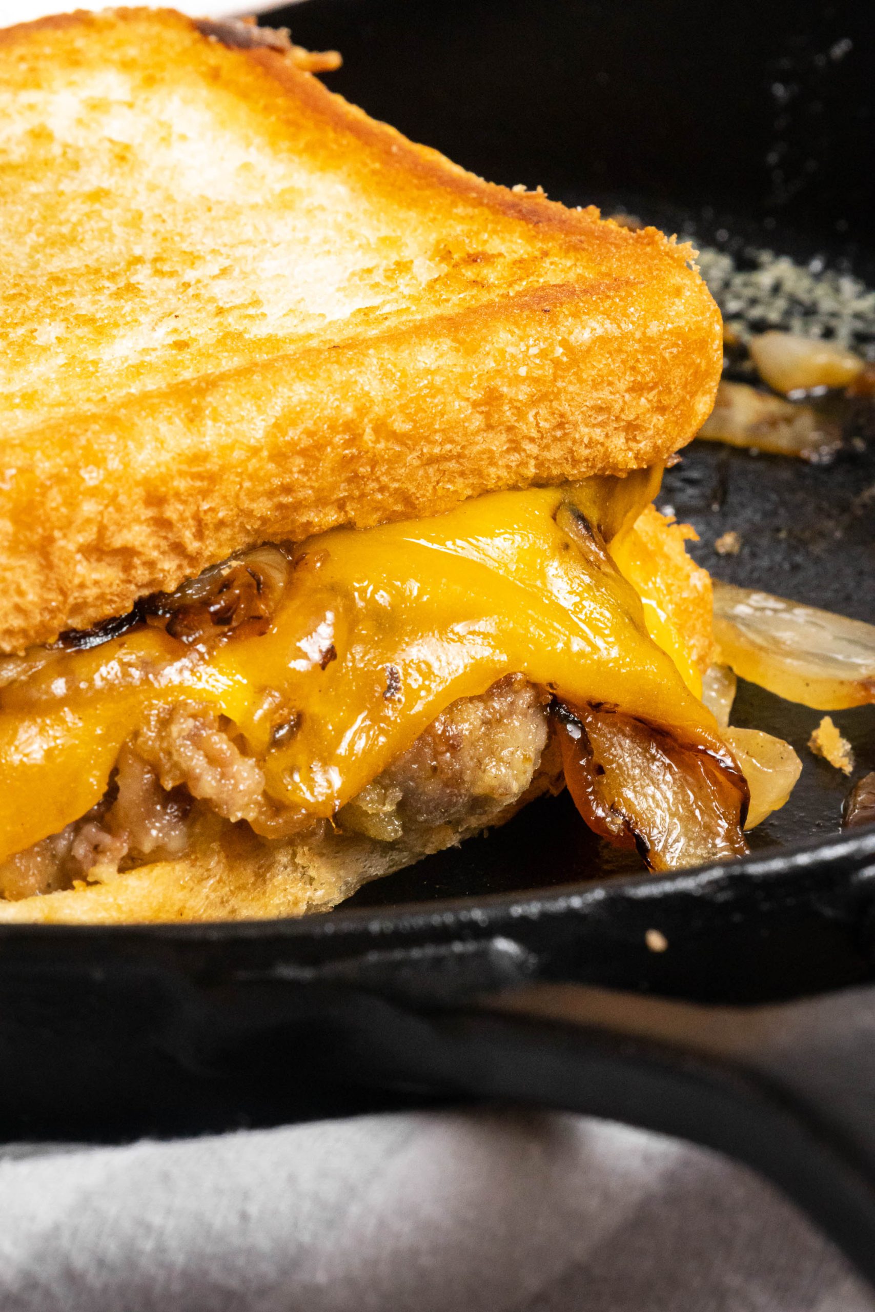 Chicken Fried Steak Patty Melt on a white plate.