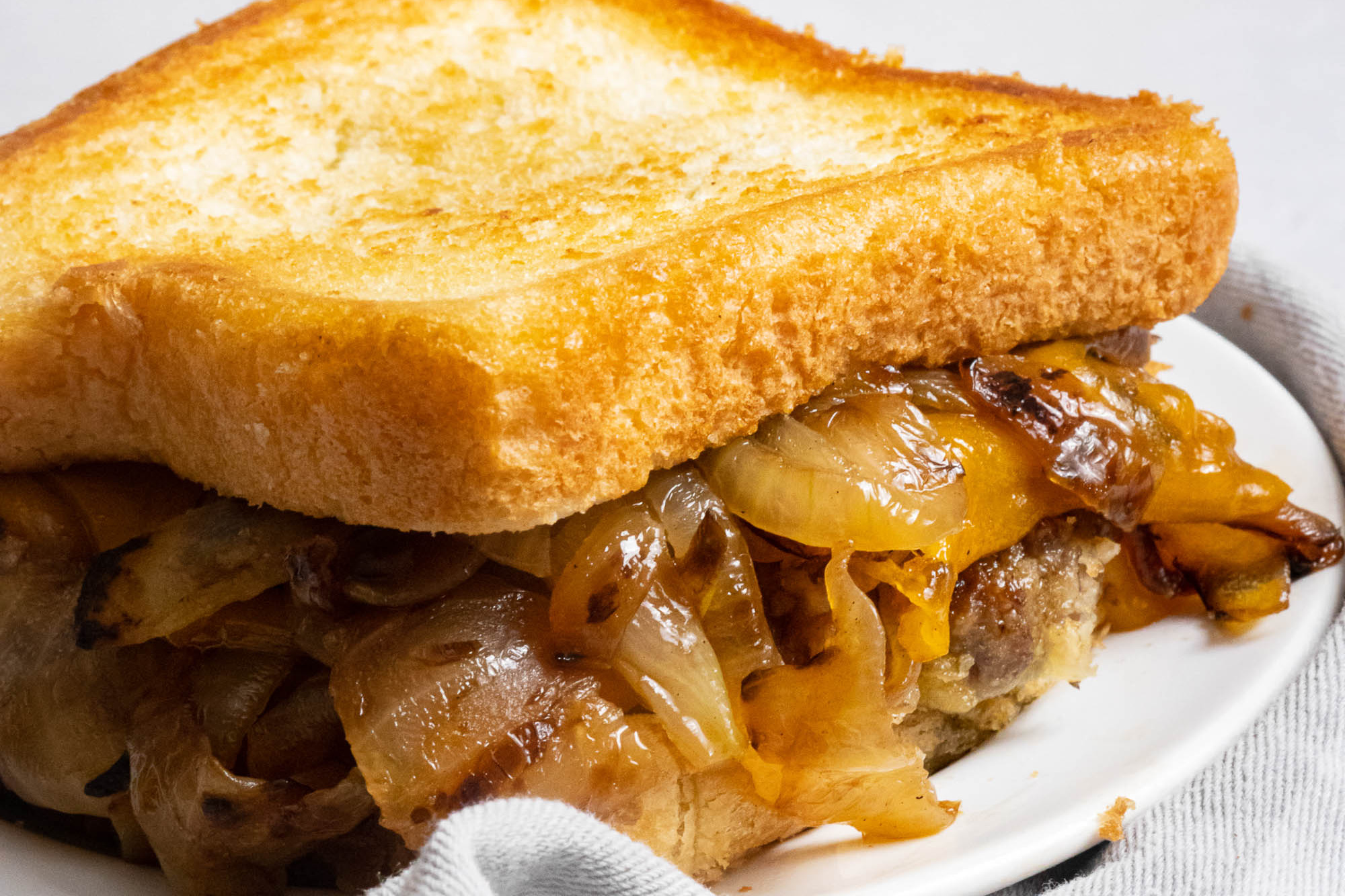 Chicken Fried Steak Patty Melt whole on a plate.