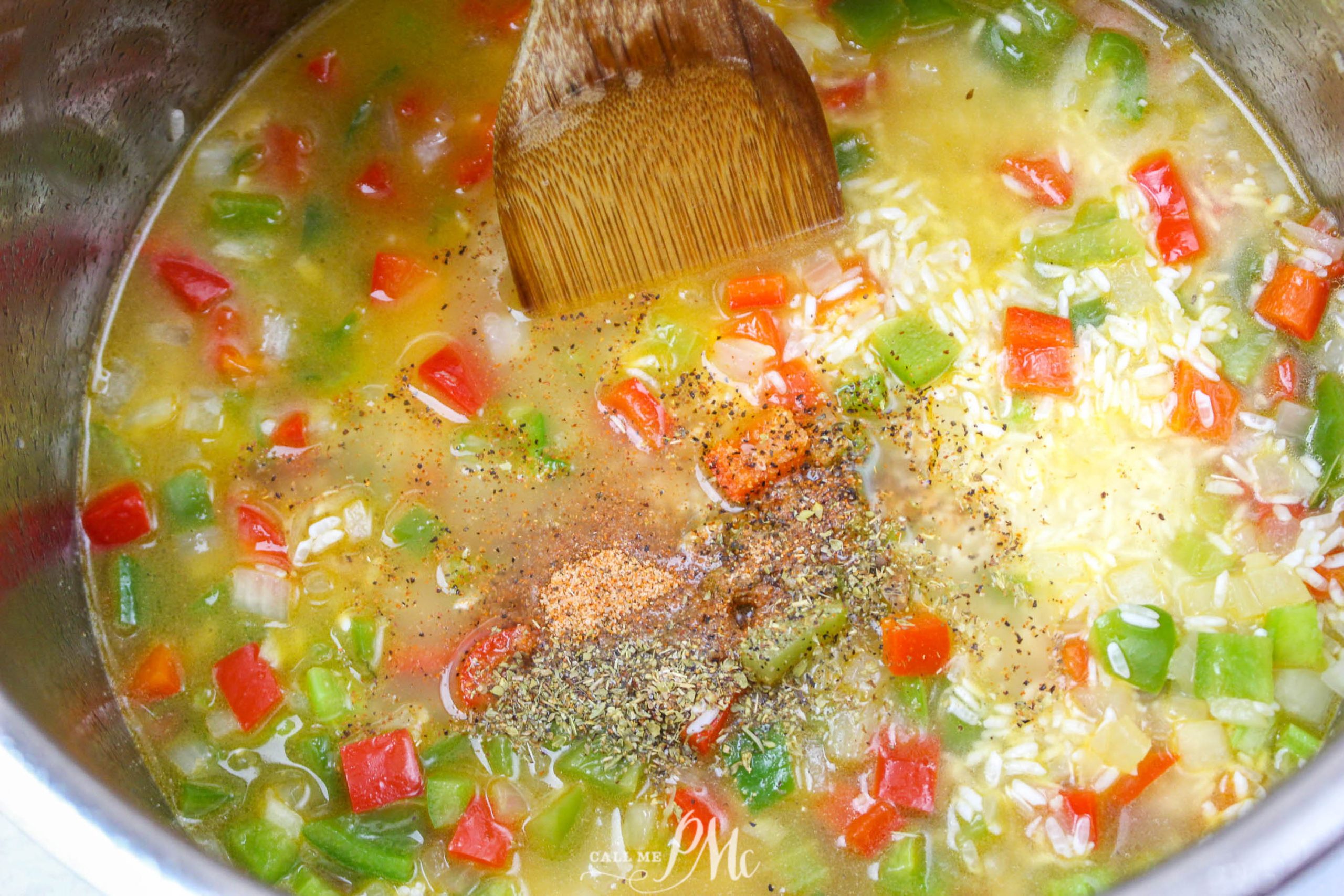 peppers and onion in chicken stock in pot