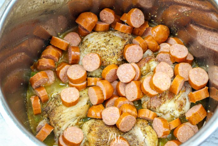 chicken and sausage in pot
