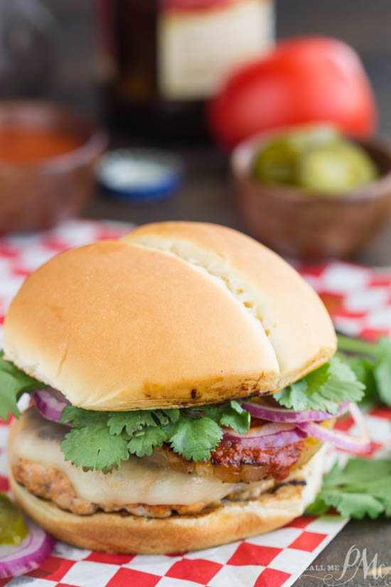 Pork burger sitting on a table.