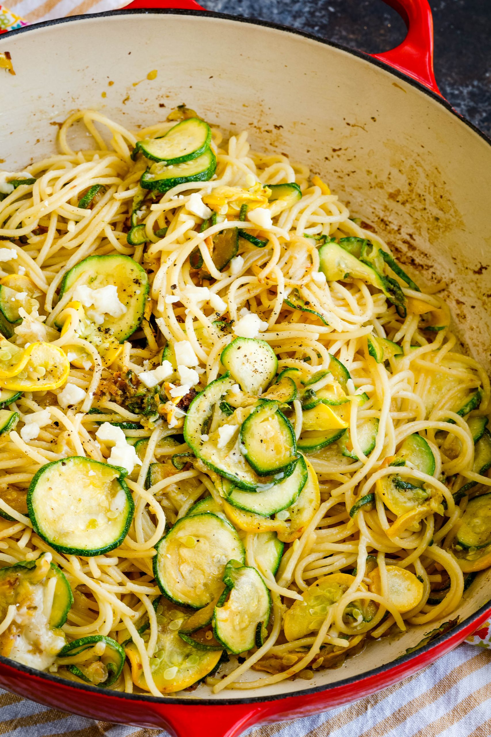 Summer Zucchini Squash Carbonara in a skillet.