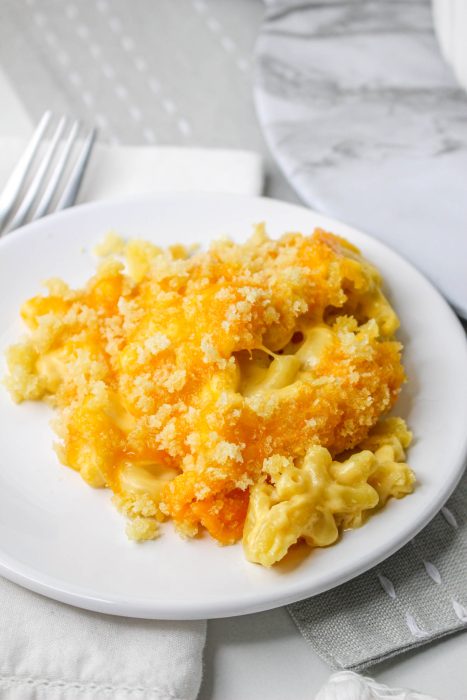 Helping of Baked Velveeta Mac and Cheese on plate.