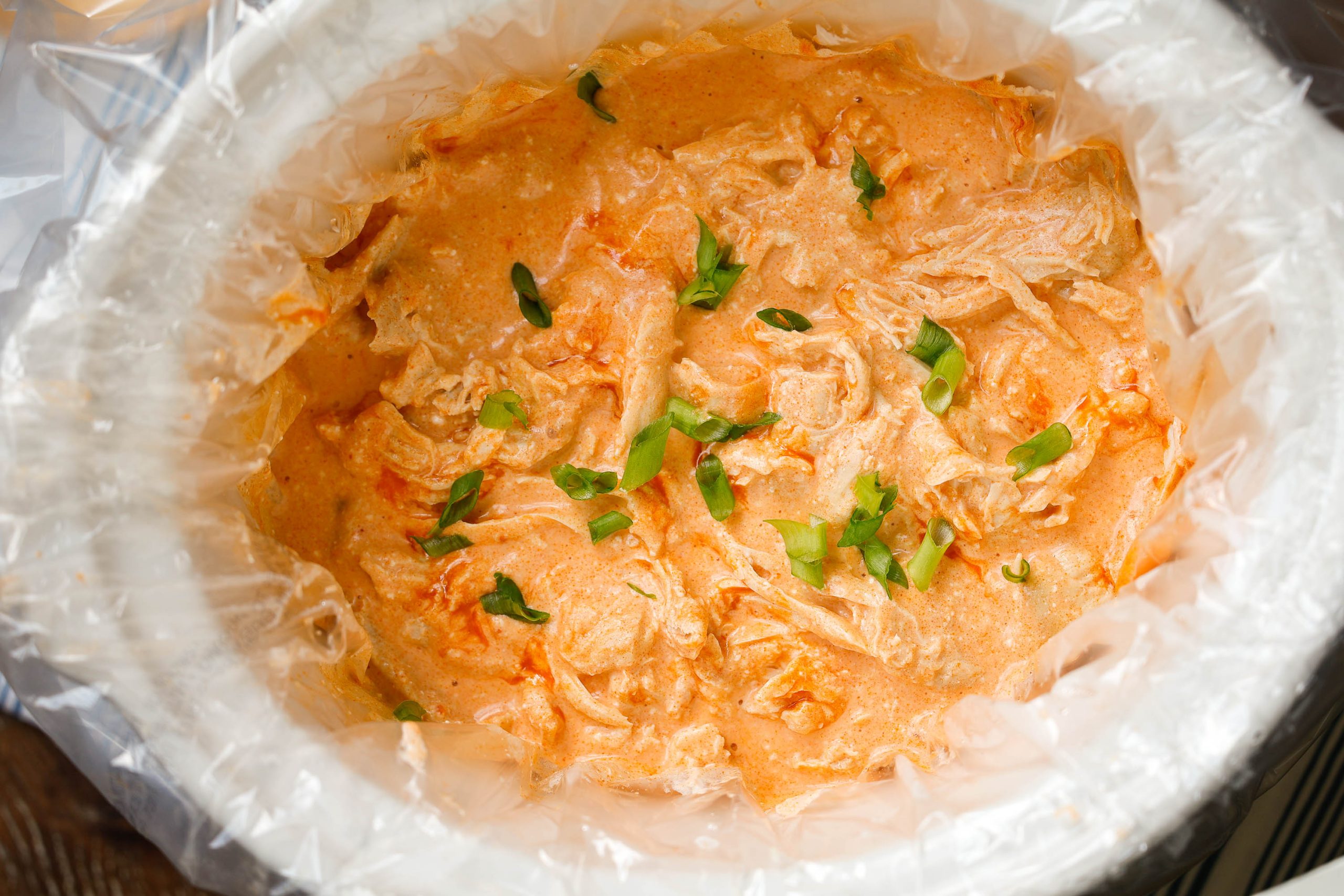 Shredded chicken in buffalo sauce.