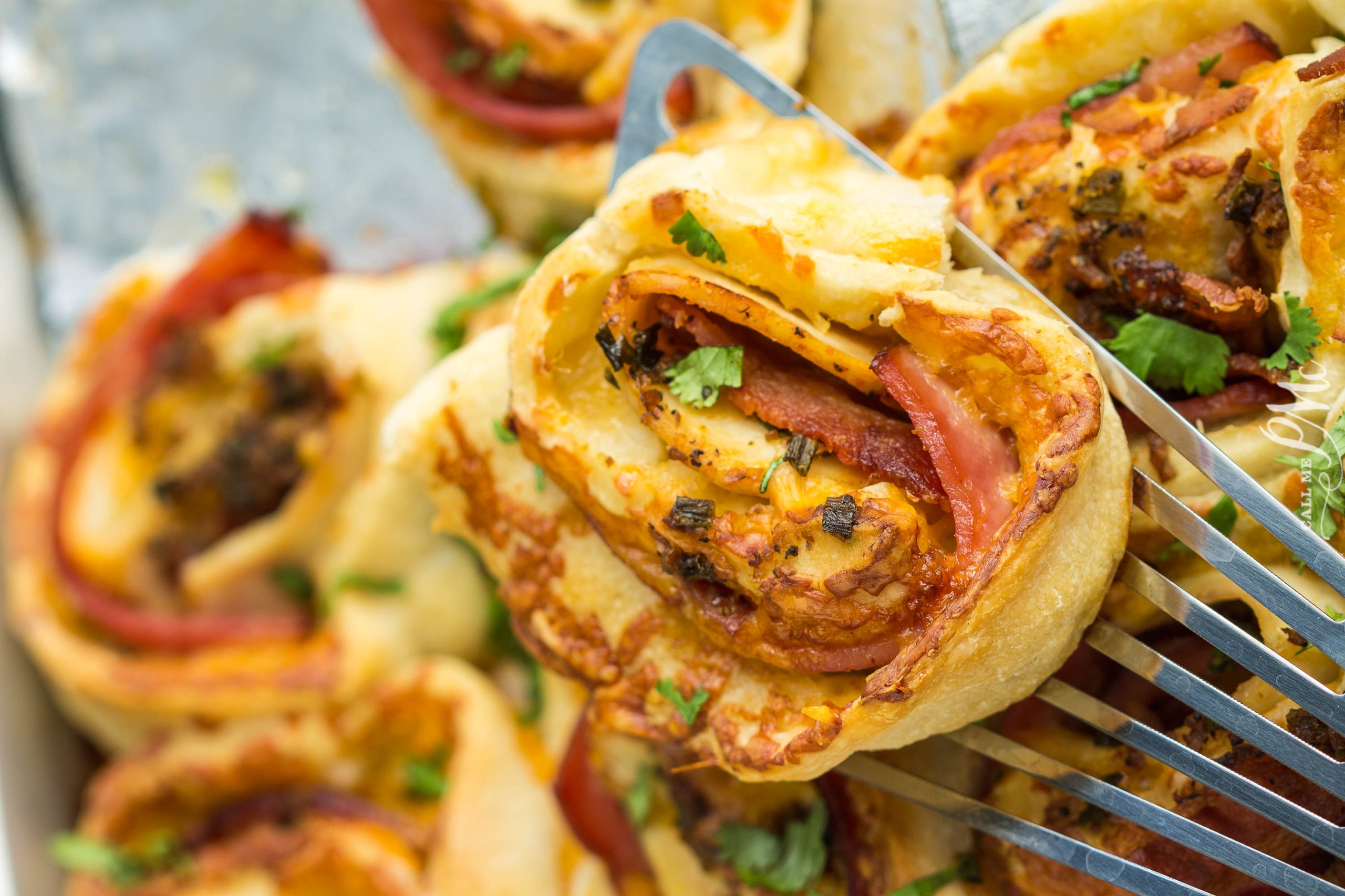 Club Pinwheels on a spatula for serving.