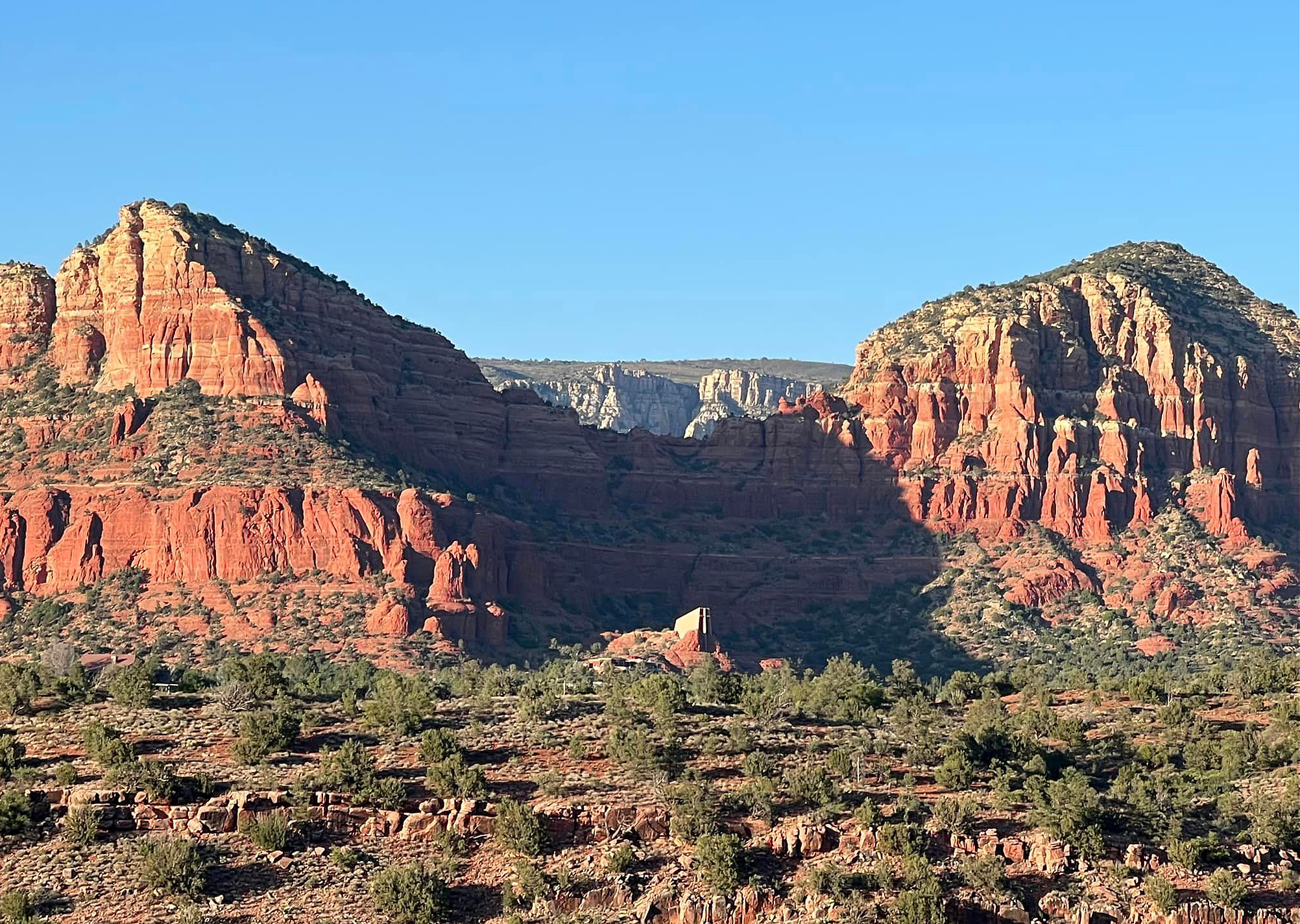 beginner's guide to Sedona. View of mountains and Chapel of the Holy Cross.