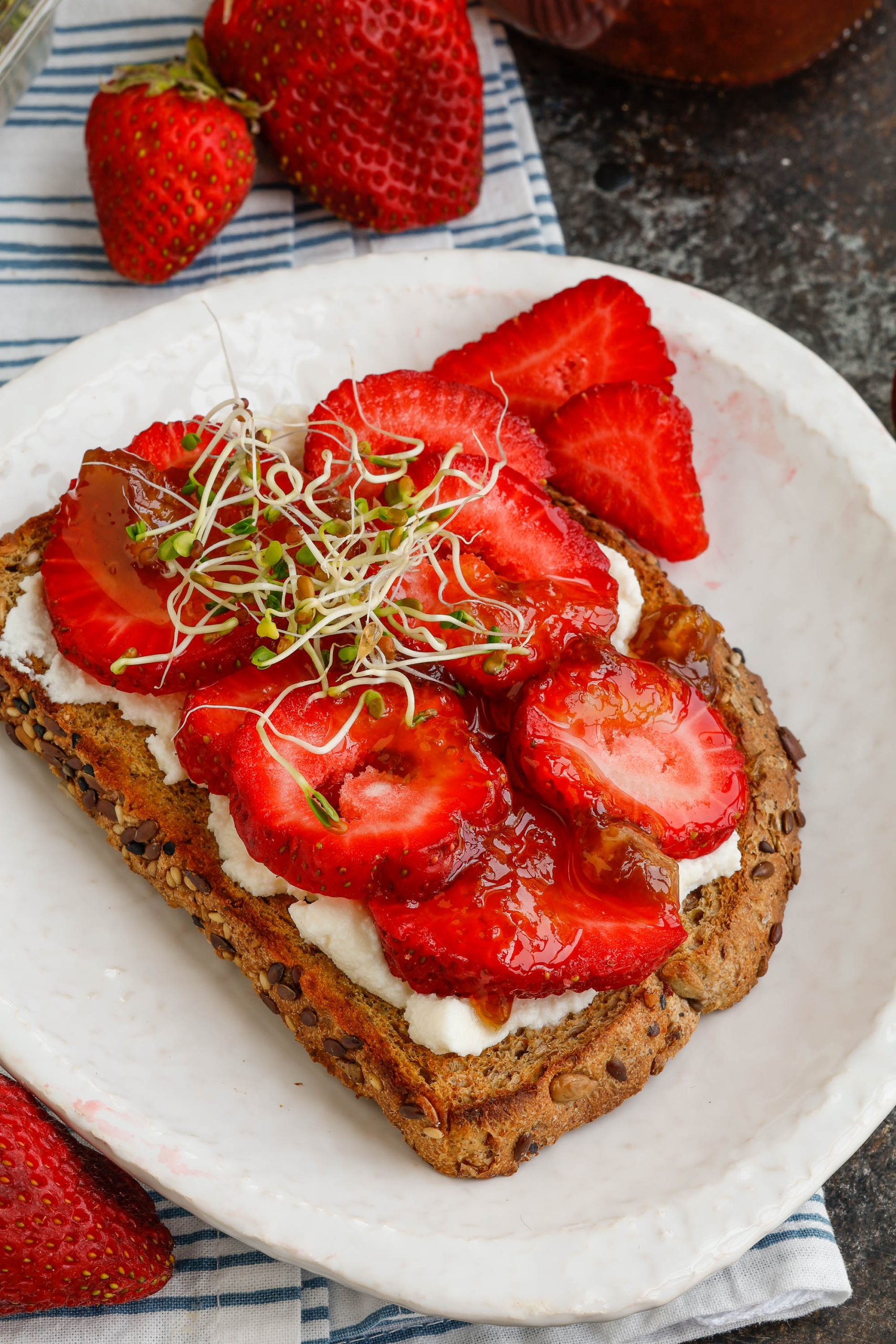 Strawberry Ricotta Toast with sprouts