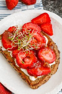 Strawberry Ricotta Toast with sprouts